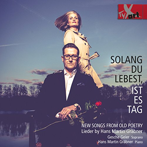 A man and woman on a CD cover with a blue sky background.