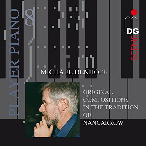 "CD cover featuring a man's portrait and piano keys on a grey background."