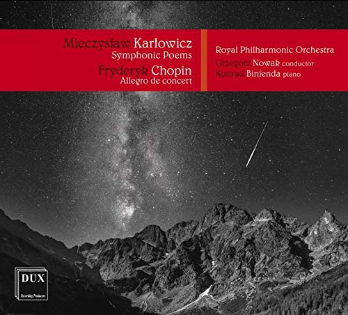 "CD cover with mountain landscape, starry sky, and red banner with white text."