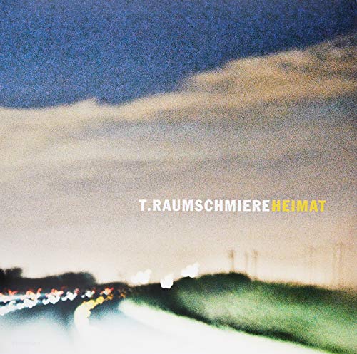 The alt text for the image is: "Album cover with highway at dusk and text overlay."