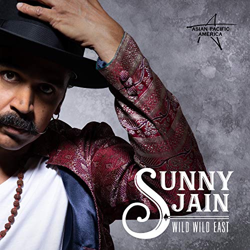 "Album cover featuring a man in a hat and patterned jacket, with text 'Sunny Jain Wild Wild East'."