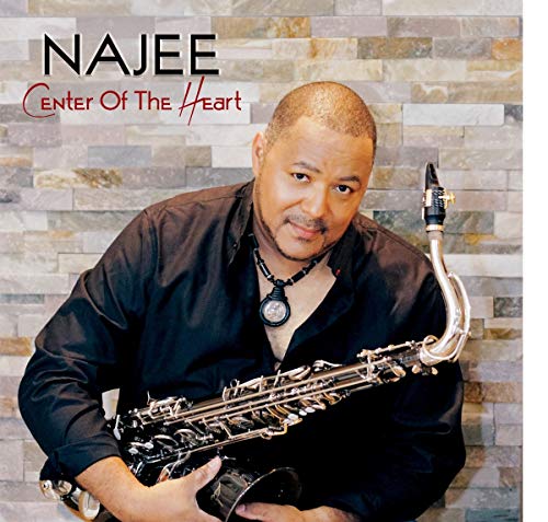 "Album cover: man holding saxophone, 'Najee' and 'Center Of The Heart' text."