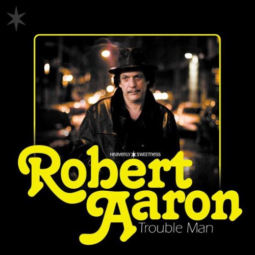 "Album cover with Robert Aaron's photo and 'Trouble Man' title on a black background."