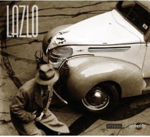 Album cover: man in hat crouches beside a damaged vintage car.