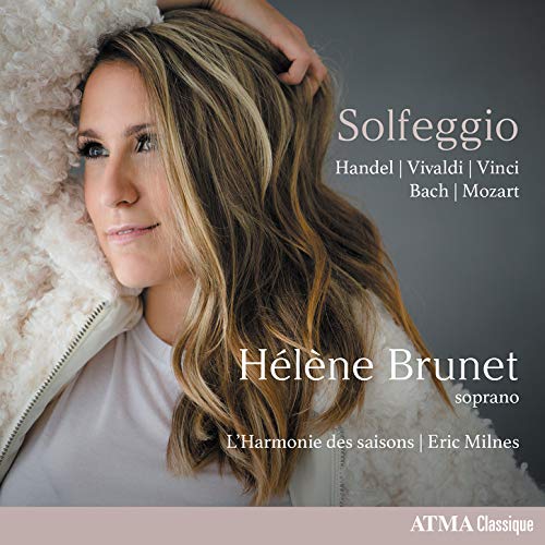 "CD cover featuring a woman with long blonde hair and white jacket."