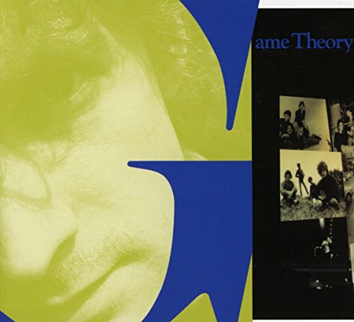 "Vinyl record cover with a black background, blue text, and sepia-toned photos of a band."