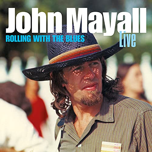"Album cover featuring a man with a hat and painted face, titled 'John Mayall Live'."