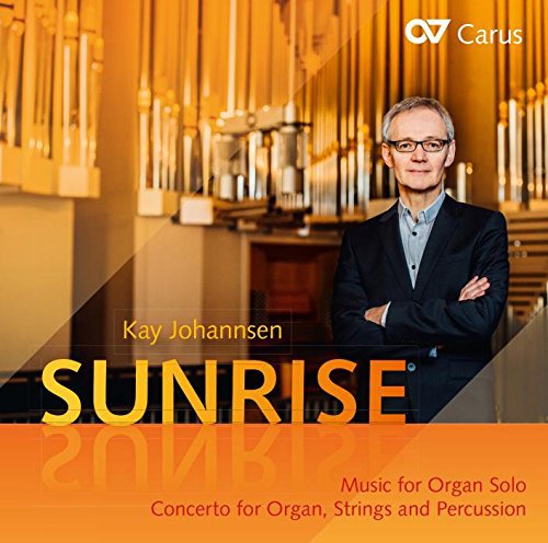 CD cover featuring a man standing by an organ with "SUNRISE" text overlay.