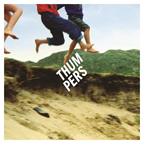 "Album cover with children jumping over a sand pit, 'Thumpers' text overlay."
