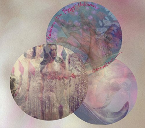 "Album cover with three overlapping circles showing surreal images and red text on a beige background."