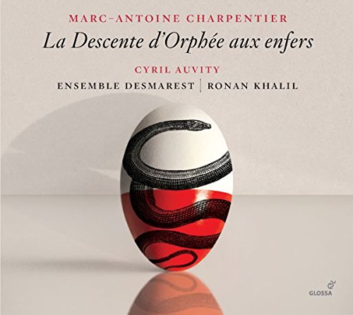 CD cover with egg-shaped object and snake, beige background, artist and title text.