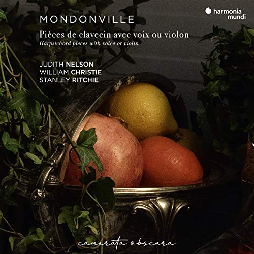 "CD cover with a bowl of fruit surrounded by foliage, artist names listed."