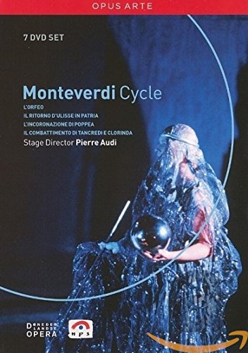 DVD cover featuring a woman in a sparkly blue costume holding a reflective orb.