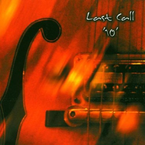 Album cover featuring a close-up of a guitar headstock and strings, with orange-toned background.