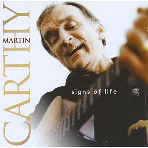 Martin Carthy's album cover: man playing guitar, smiling, against a white background.
