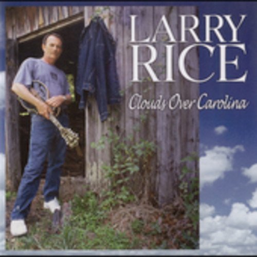 Album cover featuring a man holding a mandolin, standing by a wooden barn.