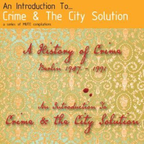 "CD cover with orange, black, and patterned sections, featuring red and white text."