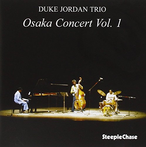 "Duke Jordan Trio" CD cover featuring a jazz trio performing on a dimly lit stage.