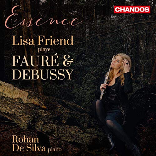 A woman sits in a forest, holding a flute, on a CD cover.