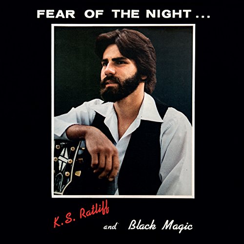Vinyl album cover featuring a man with a guitar on a black background.