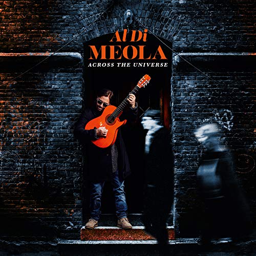 "Album cover featuring Al Di Meola holding an orange guitar in a dark doorway."