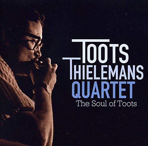 The image is a CD cover featuring a man playing the harmonica. The alt text for this image could be: "Man playing harmonica with text "Toots Thielemans Quartet" and "The Soul of Toots" nearby, on a dark background."