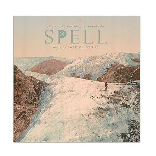Vinyl record cover with a person walking on a snowy mountain path, titled "Spell".