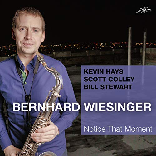 Man holding saxophone on album cover with cityscape at night and text overlay.