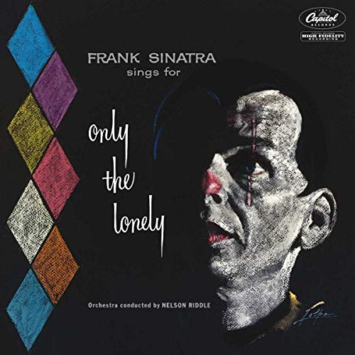 "Album cover with Frank Sinatra's portrait and colorful diamond pattern on a black background."