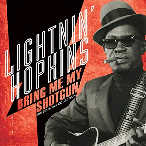 "Clear vinyl record with red and black album cover featuring Lightnin' Hopkins playing guitar."