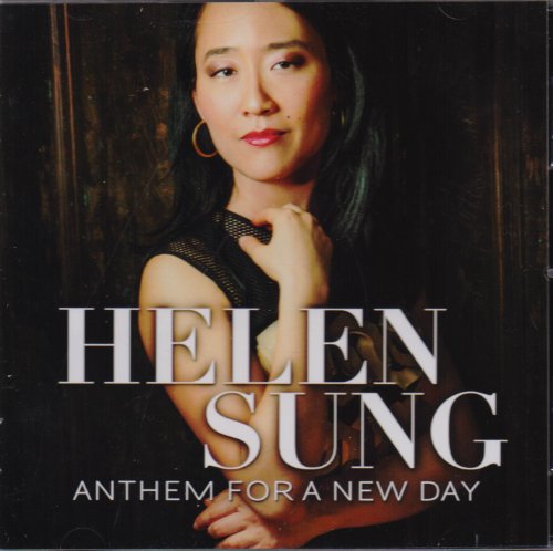 "CD cover with a woman in a black top against a dark background."
