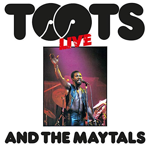 "Album cover featuring a man singing into a microphone on stage."