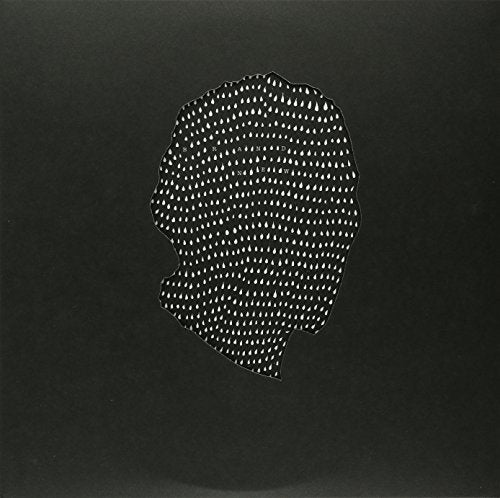 Black vinyl record cover with a white dotted pattern forming a head shape.