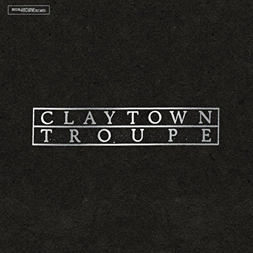 "Black vinyl record sleeve with 'Claytown Troupe' text in white rectangular boxes."