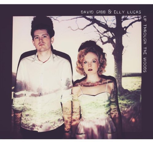 "Album cover with a man and woman standing in front of a tree."