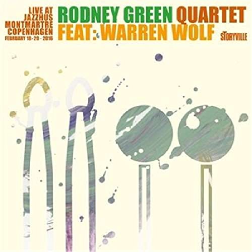 "CD cover with abstract drumsticks and text on a pale yellow background."