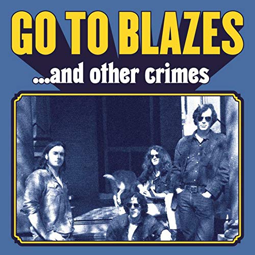 "Blue vinyl album cover with band photo and yellow and white text."