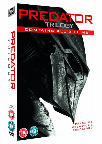 DVD case with Predator Trilogy title, featuring a Predator's helmet and skull.