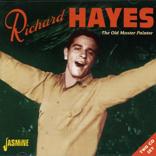 Album cover with man in yellow shirt, arms outstretched, against a green background.