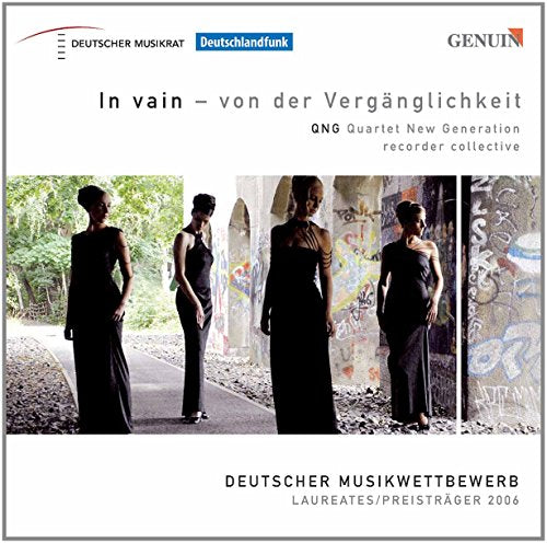 CD cover with four women in black standing against a graffiti wall.