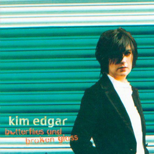 Kim Edgar album cover featuring a man in a black jacket and white shirt.