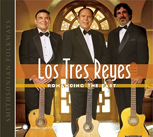 "CD cover featuring three men in tuxedos holding guitars, with title and logo."