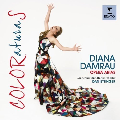 CD cover featuring a woman in a multicolored dress, arms raised, against a white background.