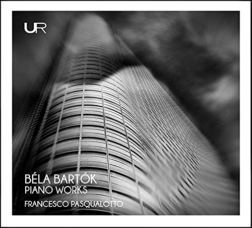 A black-and-white piano album cover featuring piano strings and white text on a white border.