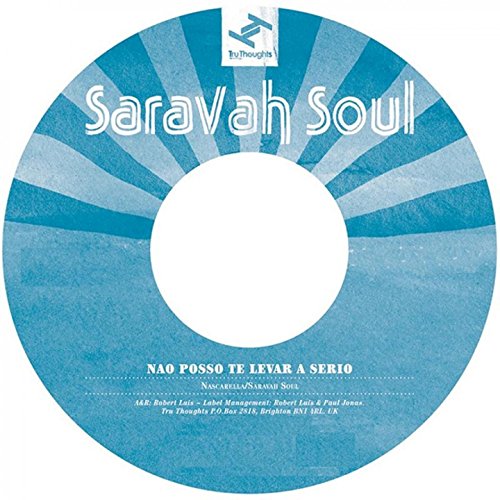 A blue vinyl record with white text and a sunburst design.