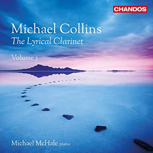 "Album cover with serene lake scene, stepping stones, and white text."