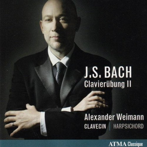CD cover featuring a man in a suit with text "J.S. Bach Clavierubung II".