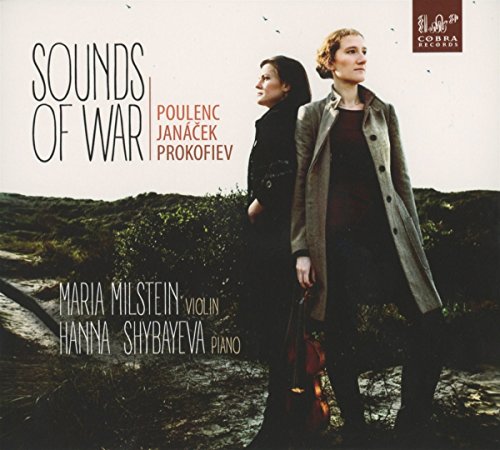 "CD cover featuring two women standing by a stream, dark attire, outdoors."