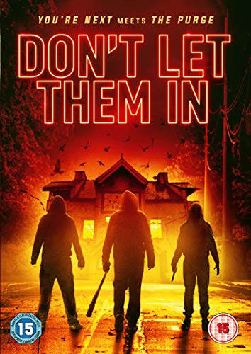 "DVD cover with three hooded figures approaching a house, ominous atmosphere."