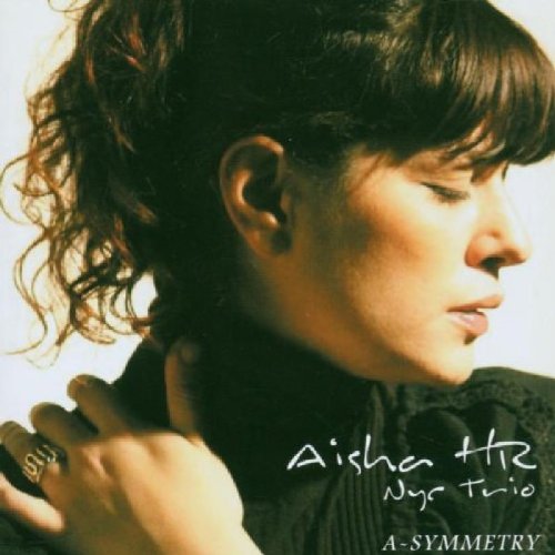 "Album cover featuring a woman with dark curly hair and black clothing."